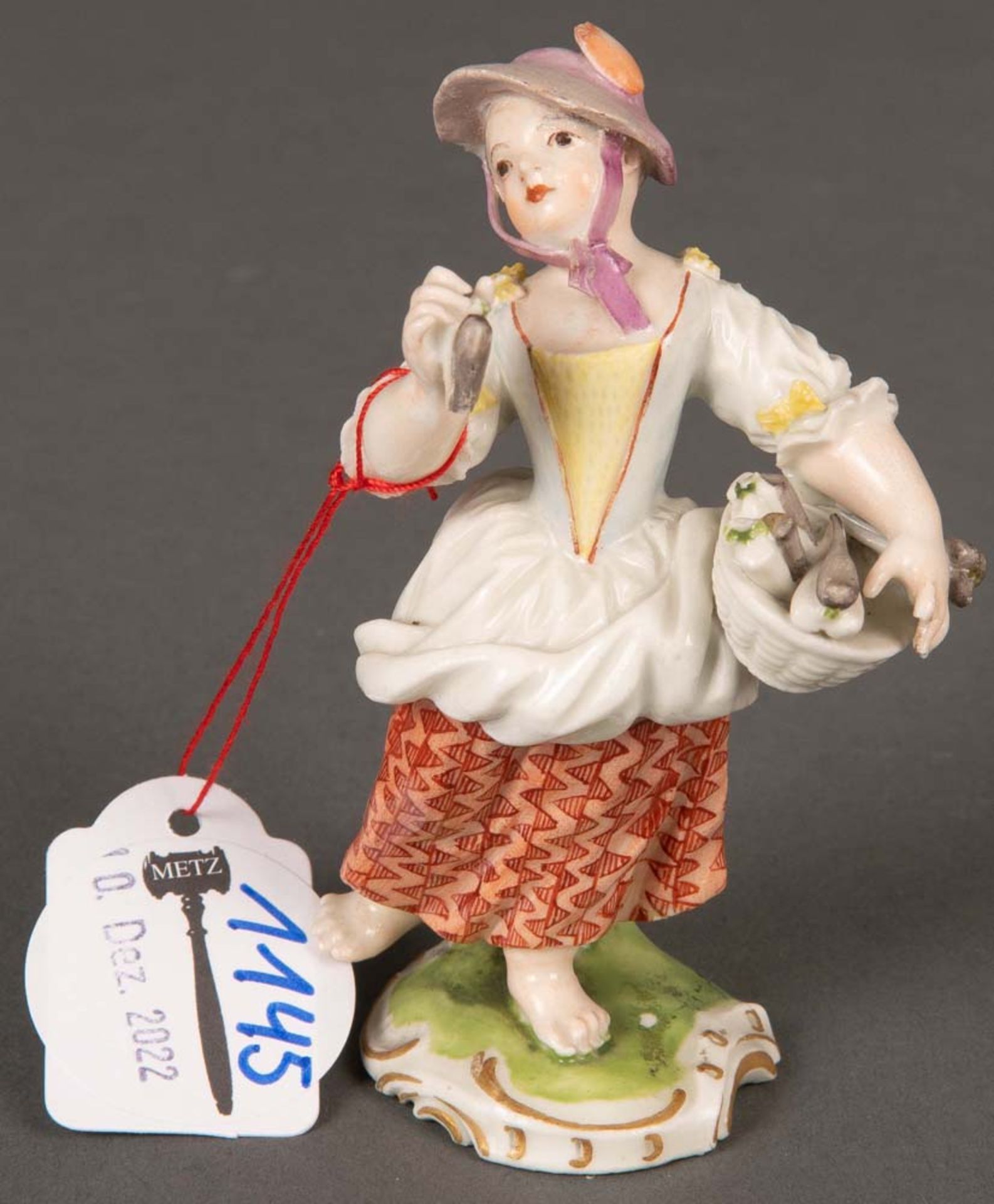 „Die lustige Obstverkäuferin“. Frankenthal 1770. Porzellan, bunt bemalt, ohne Marke. Modell von