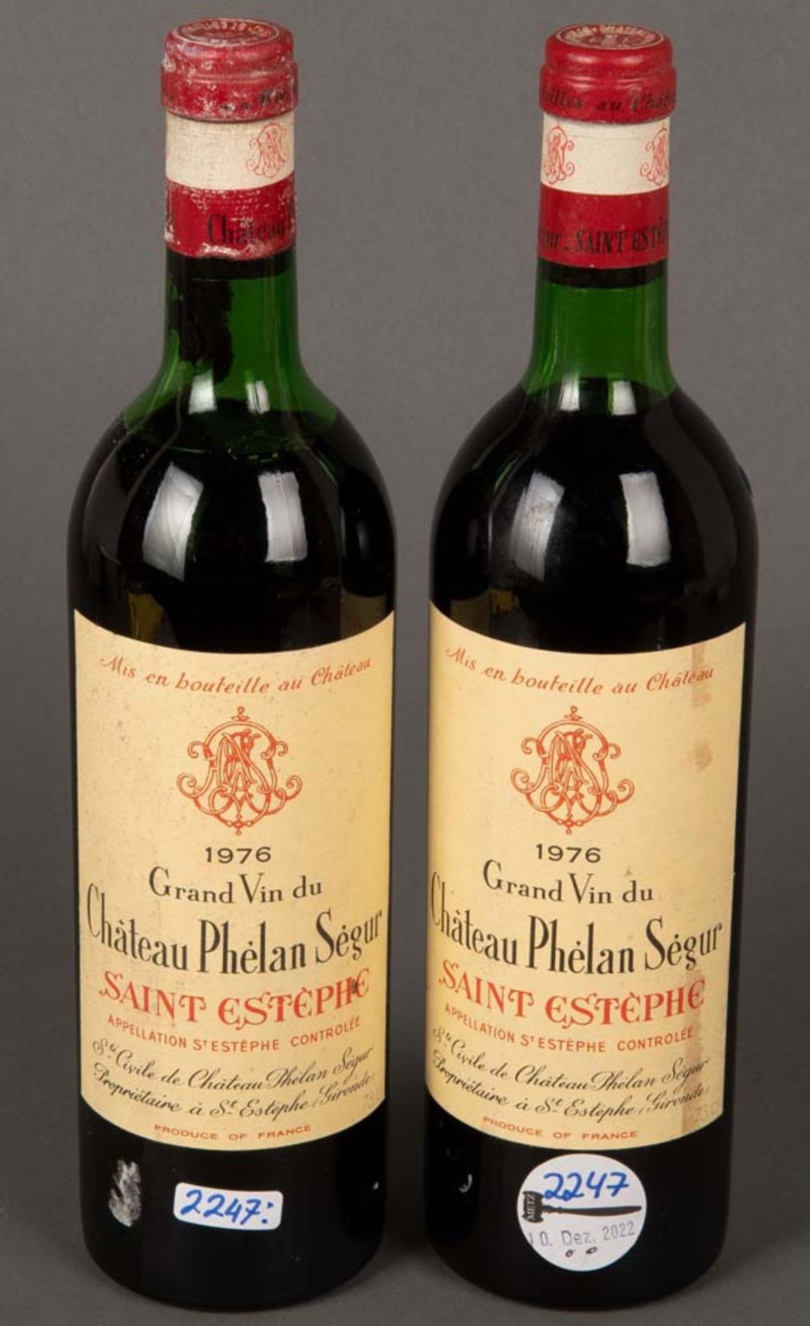 Zwei Flaschen Château Phélan Ségur. Jahrgang 1976. (Genießbarkeit unbekannt)