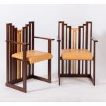 Coppia di sedie in legno con seduta in pelle. Prod. Italia, 1980 ca. Cm 90x47x58. (difetti)