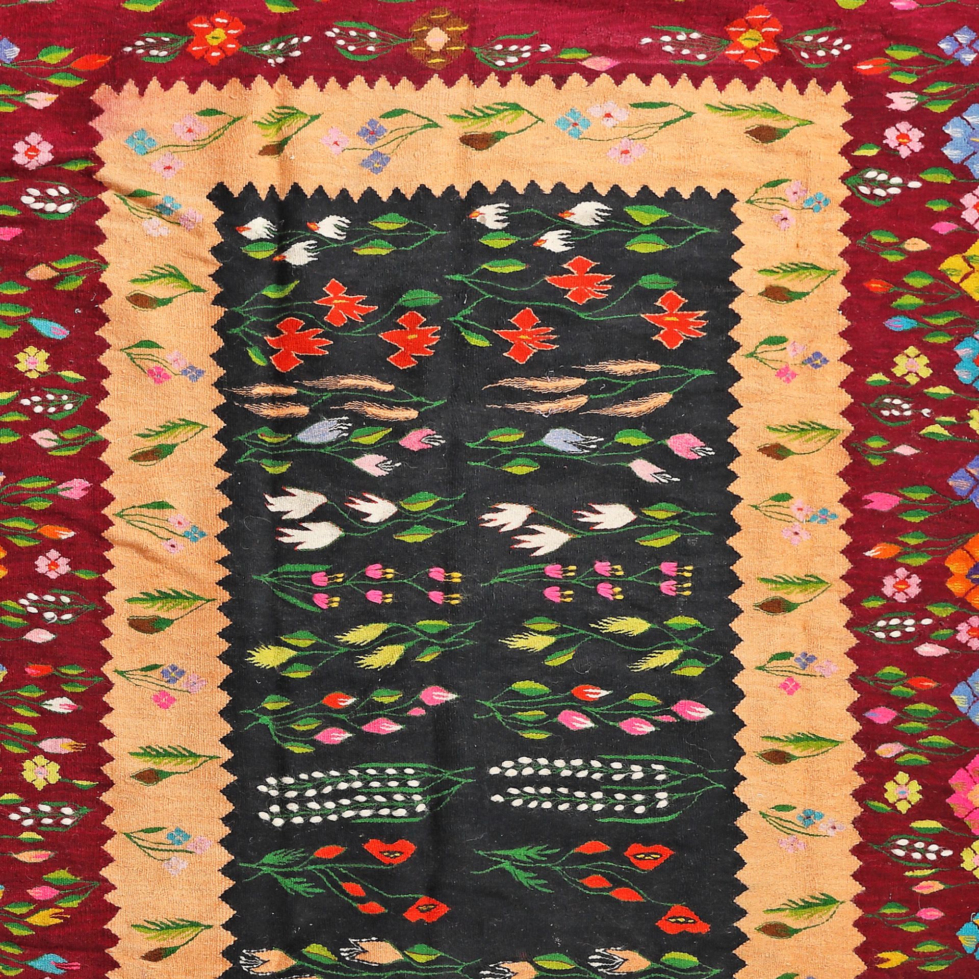 Oltenian wool rug, decorated with hollyhocks, tulips and lilies of the valley, mid-20th century - Image 2 of 2
