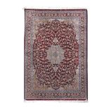 Qum (Ghom) silk rug on silk warp, decorated with rich floral motifs, Iran