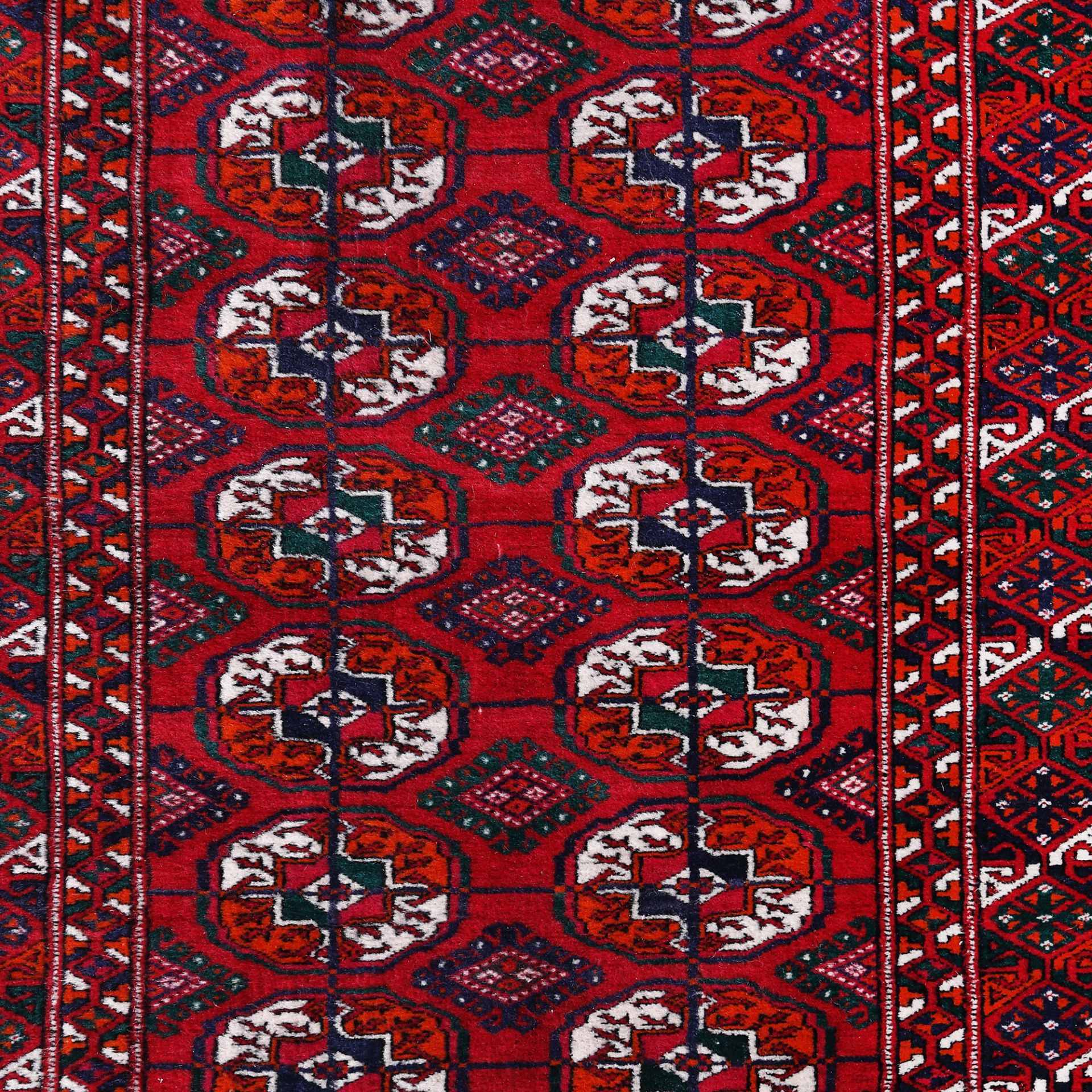 Tekke-Buhara wool rug, decorated with specific motifs, Turkmenistan - Image 2 of 2