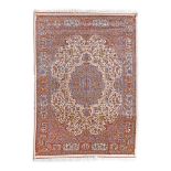 Qum (Ghom) silk rug on silk warp, decorated with capricorns and Zoroastrian motifs, Iran