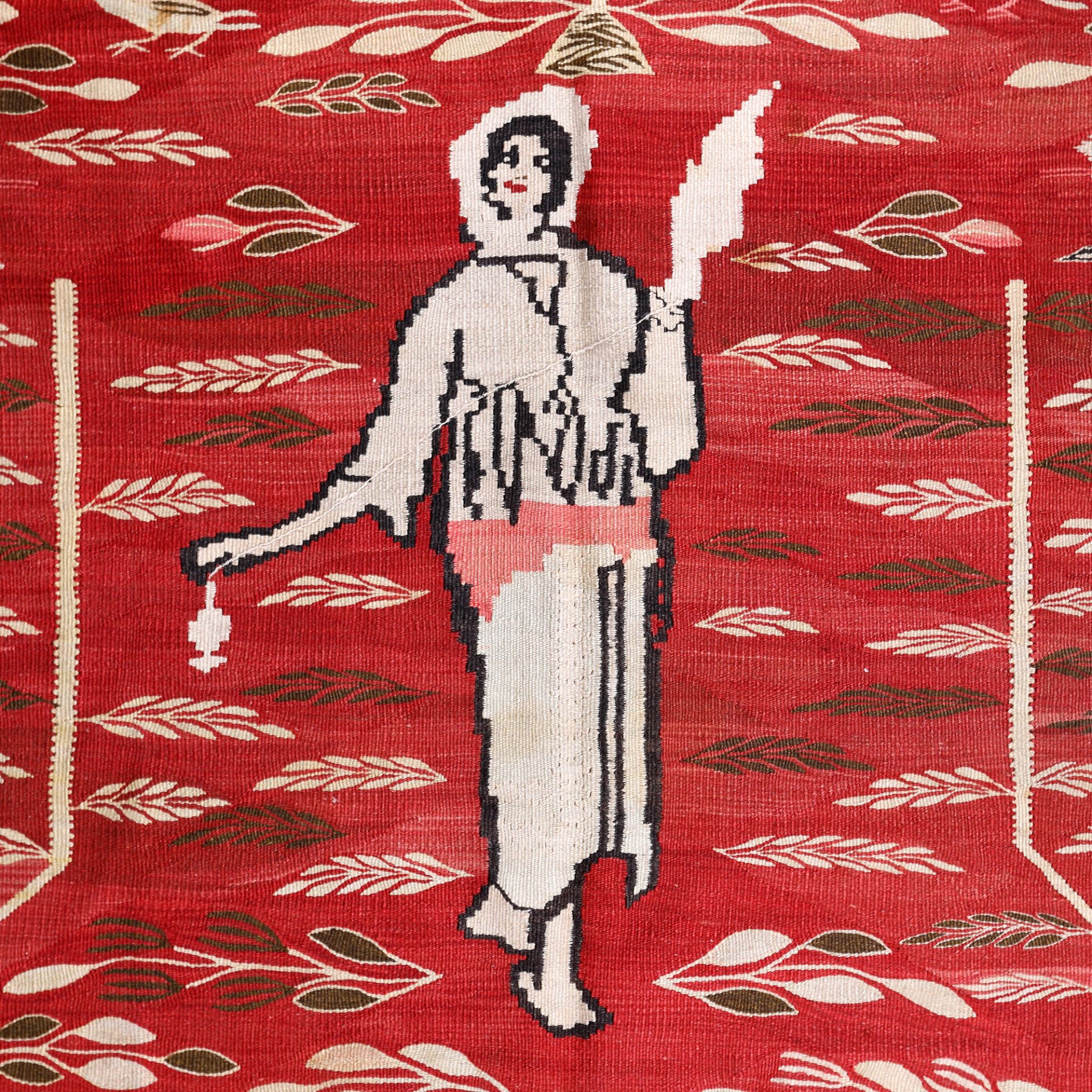 Oltenian wool rug, decorated with peasant girl with distaff and rich floral motifs, early 20th centu - Image 3 of 3