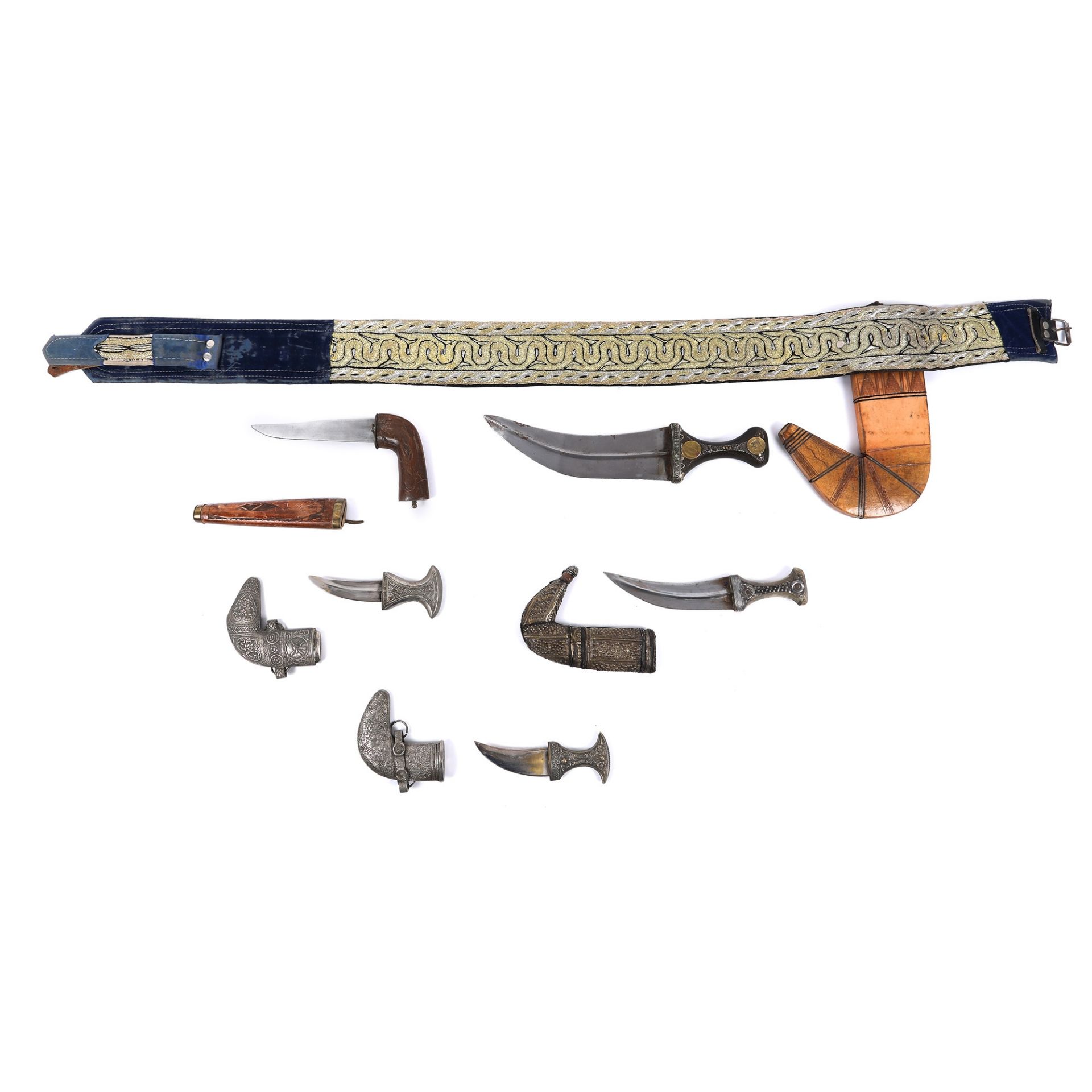 Jambaiya dagger, three miniature daggers, and belt, Yemen, start of the 20th century