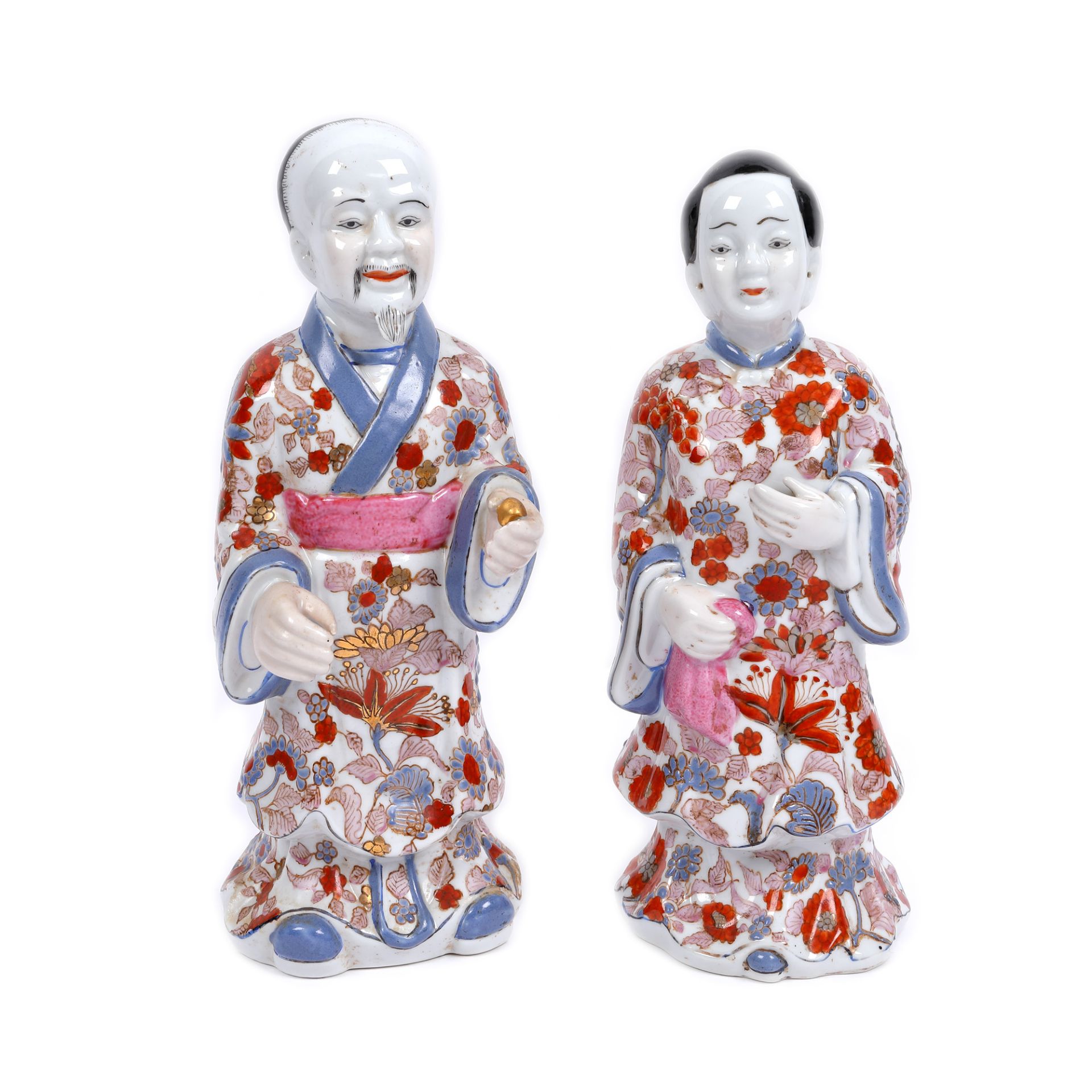 Pair of painted porcelain statues, Imari, representing a couple of noble people, Japan, first half o