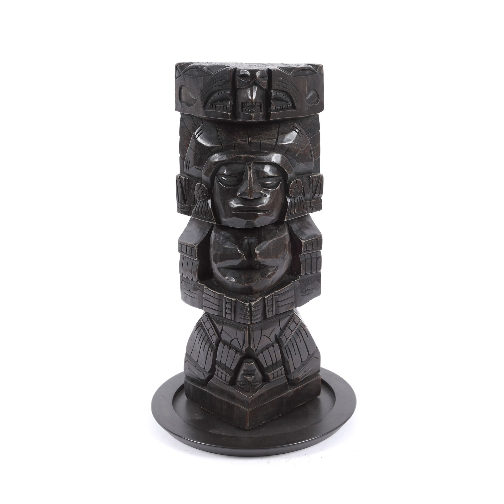 Totem made of exotic wood, together with a round base, Central America, mid-20th century