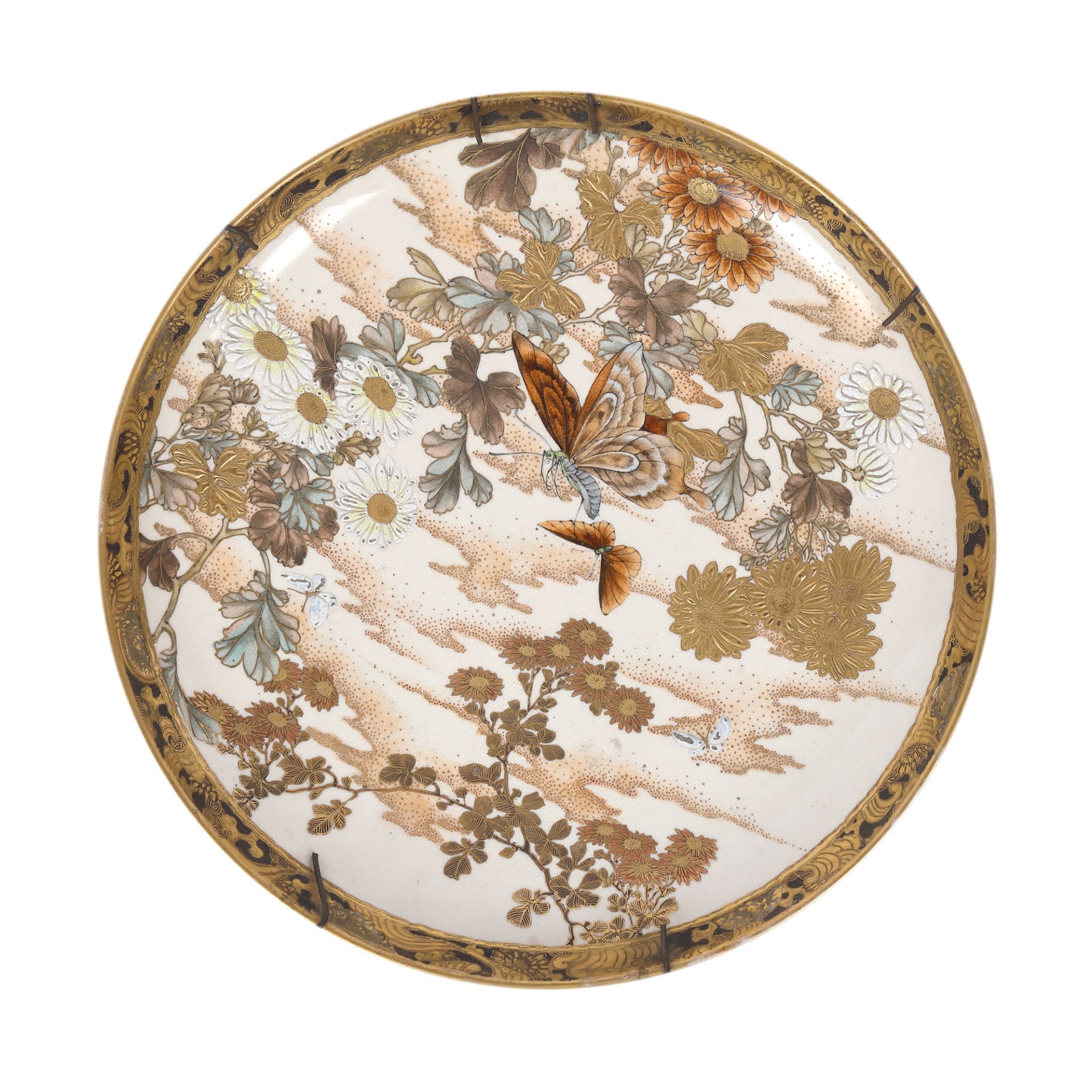 Porcelain plate embellished with butterflies and chrysanthemums, Imari, Japan, first half of the 20t