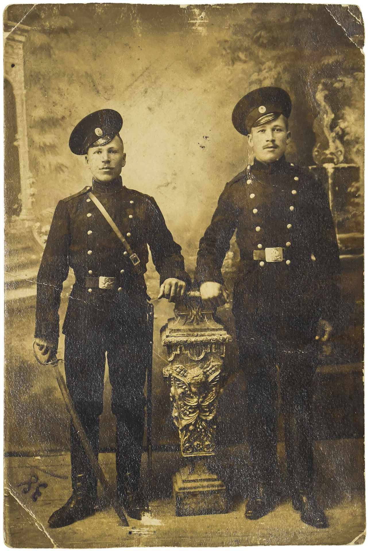 Photograph of military servants. 1910s. 13x9 cm.