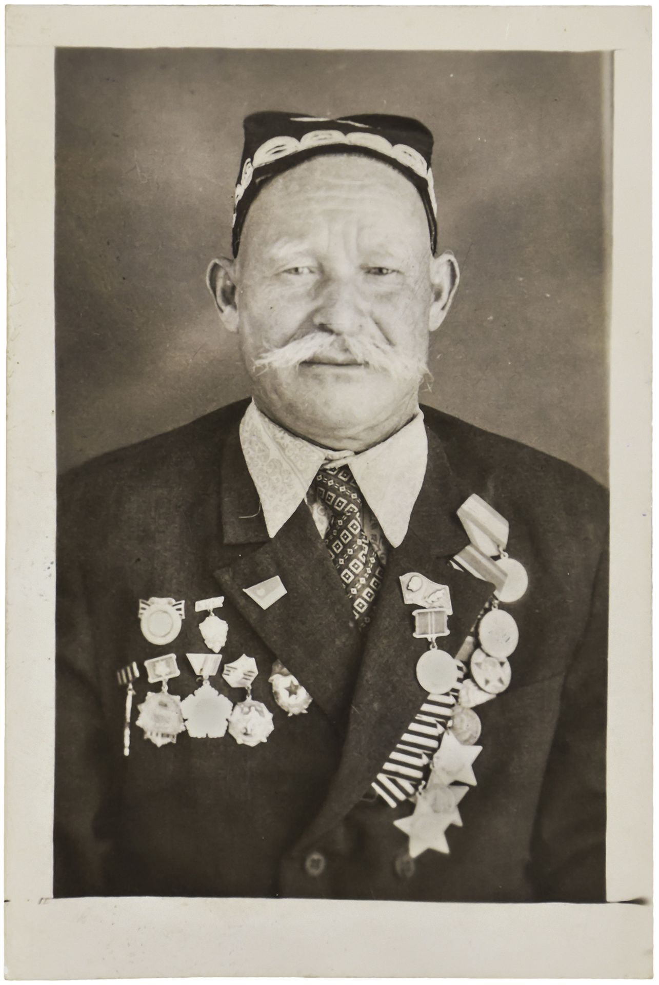 Portrait of Rakhim Avezmuratov, the full Cavalier of Order of Glory. Photograph. 1970s. 9x6 cm.