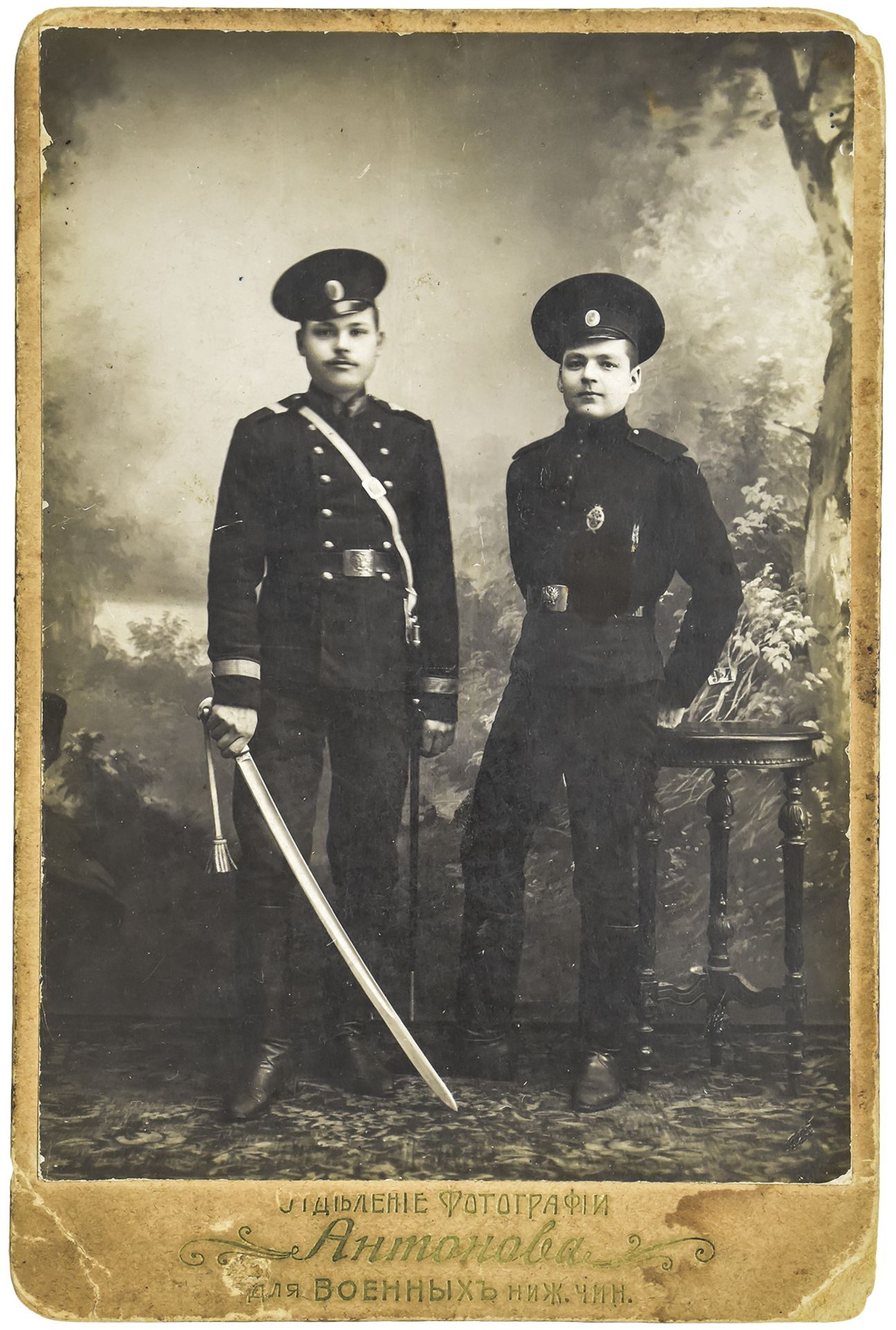 Antonov, A. Cabinet portrait of two military servants. Photograph. 1910s. 15x10,5 cm.