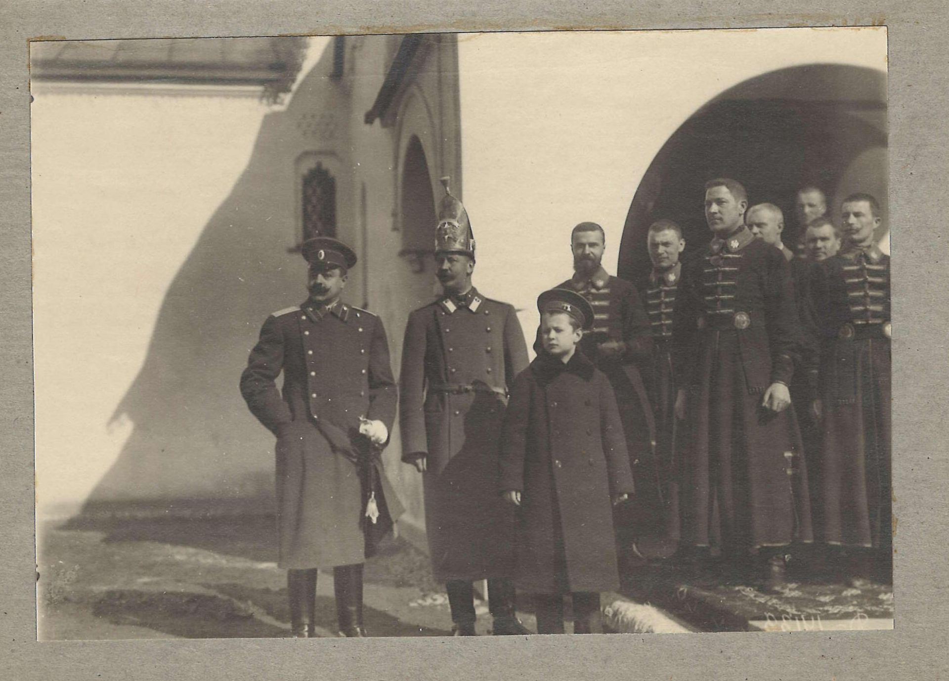 [Russian; Tsar] A group of soldiers near the building of the Fedorov's Tsar's Cathedral on the day o