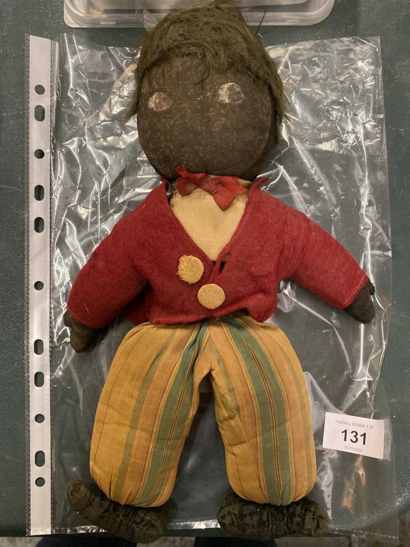 A VINTAGE TEDDY/DOLL WITH HANDMADE CLOTHES