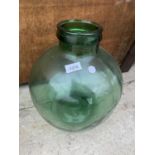 A LARGE GREEN GLASS VASE