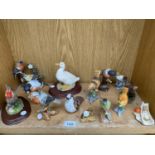 A LARGE ASSORTMENT OF CERAMIC BIRD FIGURES