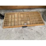 A VINTAGE WOODEN PRINTERS TRAY WITH PERSPEX SHEET