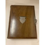 A WALNUT AND LEATHER VICTORIAN FRENCH DISPLAY ALBUM WITH LARGE METAL CLASP AND FRONT PLAQUE,
