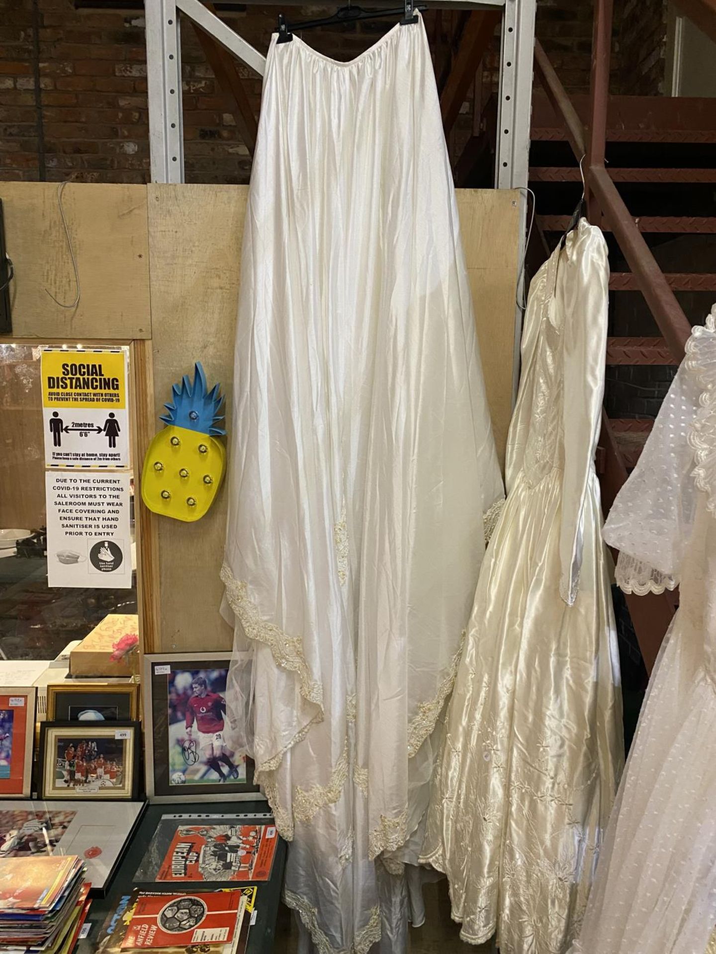 TWO FULL LENGTH WEDDING DRESSES, ONE VERY 1970'S, A SHORTER DRESS, LONG TRAIN, HEAD BAND AND VEIL - Image 4 of 6