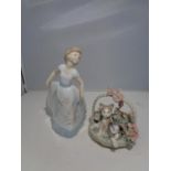 TWO FIGURINES, A NAO GIRL DANCING AND A LLADRO BASKET WITH KITTENS