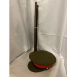 AN ARMY HAT AND TWO LEATHER COVERED SWAGGER STICKS