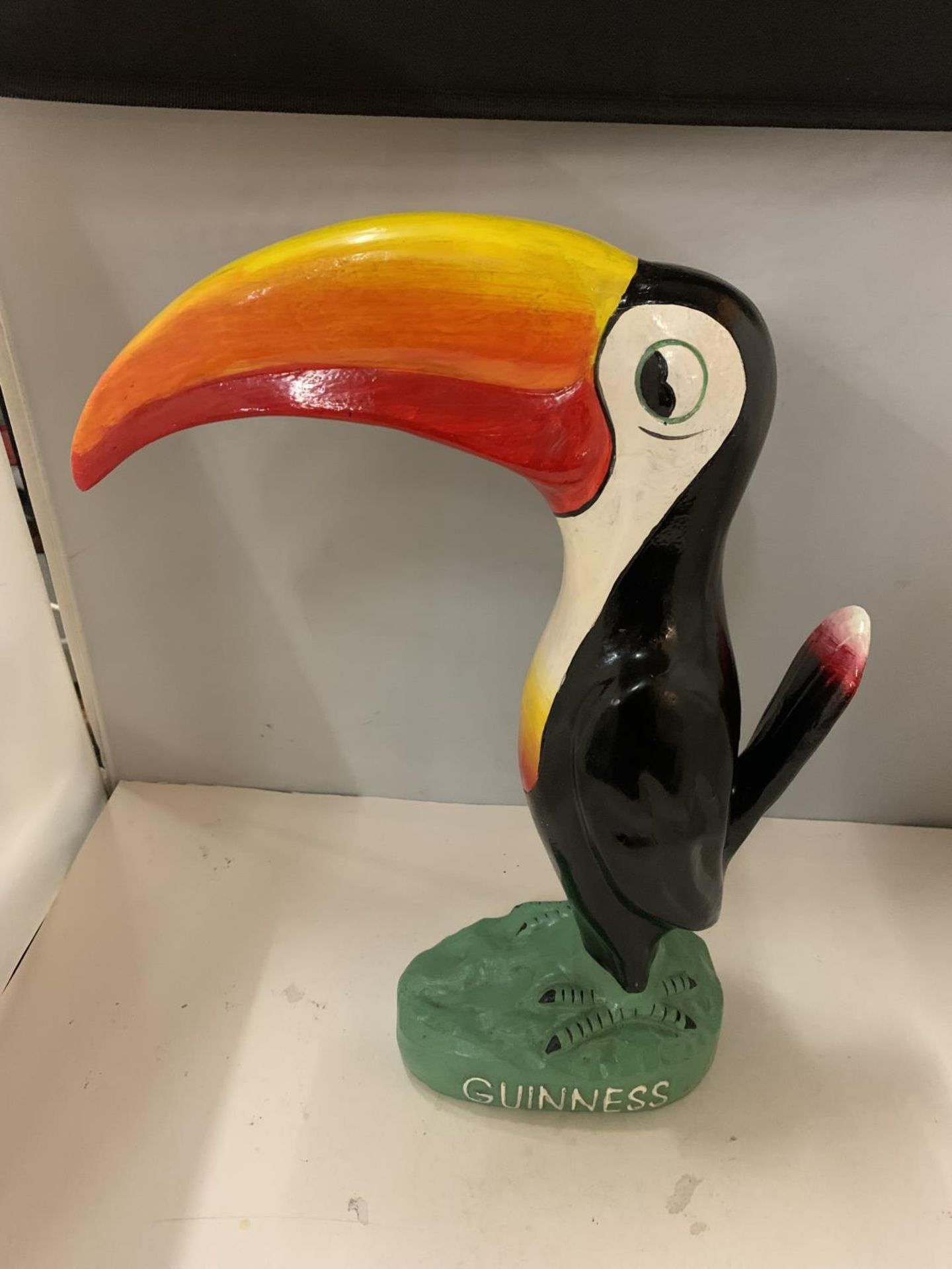 A LARGE GUINNESS TOUCAN FIGURE