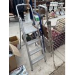 THREE SETS OF STEP LADDERS