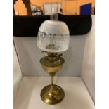 A LARGE BRASS AND OPAQUE GLASS SHADE OIL LAMP