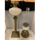 TWO BRASS AND MILK GLASS OIL LAMPS, ONE WITH GLASS FUNNEL, HEIGHTS 55CM AND 50CM