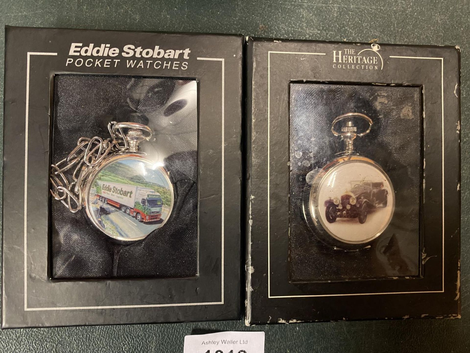 TWO BOXED POCKET WATCHES, ONE WITH AN EDDIE STOBART LORRY AND ONE WITH A CLASSIC CAR