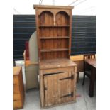 A VICTORIAN PINE CUPBOARD WITH PLATE RACK