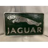 A CHROME AND RACING GREEN JAGUAR CAST SIGN