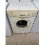 A WHITE ZANUSSI WASHING MACHINE