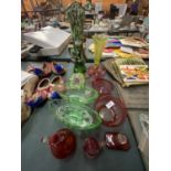 A VARIETY OF COLOURED GLASSWARE TO INCLUDE, BOWLS, VASES, PLANTERS IN GREEN AND CRANBERRY