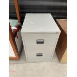 A TWO DRAWER METAL FILING CABINET