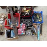 A LARGE ASSORTMENT OF VINTAGE HAND TOOLS TO INCLUDE SPANNERS, SCREW DRIVERS AND HAMMERS ETC