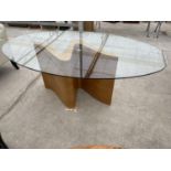AN OVAL GLASS SERPENT DINING TABLE IN THE STYLE OF TOM SCHNEIDER, 75 X 45", GLASS BEARING STAMP B.