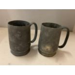 A PAIR OF HEAVY SPELTER DRINKING BEAKERS MARKED 'KUT HING SWATOW' TO BASE WITH CHINESE WRITING,