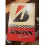 A BRIDGESTONE MOTORSPORT TIN SIGN