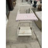 A WHITE PAINTED METAMORPHIC CHILDS HIGH CHAIR