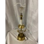 A BRASS AND CUT GLASS LAMP