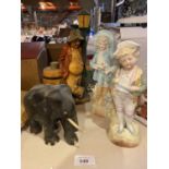 A WOODEN ELEPHANT, TWO CERAMIC CONTINENTAL STYLE FIGURES , ETC