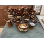 A LARGE ASSORTMENT OF LUSTRE WARE JUGS TO ALSO INCLUDE A TEAPOT