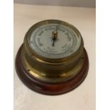 A MAHOGANY AND BRASS WALL BAROMETER, MADE IN ENGLAND