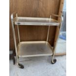 A 1970'S TWO TIER METALWARE TEA TROLLEY, BEARING LABEL 'A WOODMET PRODUCT'