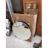A ROUND MIRROR, A WOODEN FRAMED MIRROR AND A VINTAGE IRONING BOARD