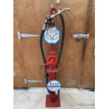 A ESSO PETROL PUMP WITH BRASS NOZZLE