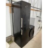 A BLACK HOOVER UPRIGHT FRIDGE FREEZER