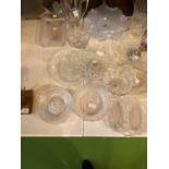 A QUANTITY OF CLEAR GLASSWARE TO INCLUDE, CAKE STANDS, VASES, PLATES, ETC