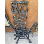 A PAIR OF DECORATIVE CAST IRON BENCH ENDS ALONG WITH A DECORATIVE ROSE BUD CAST IRON BENCH BACK