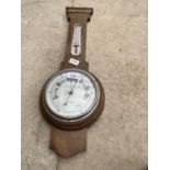 A VINTAGE WOODEN CASED BEROMETER